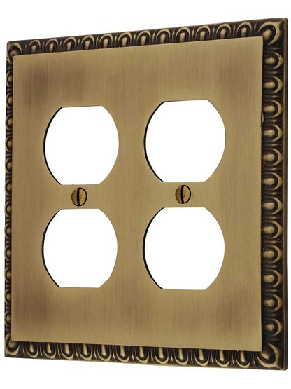 Ovolo Double Gang Duplex Outlet Cover Plate in Antique Brass.